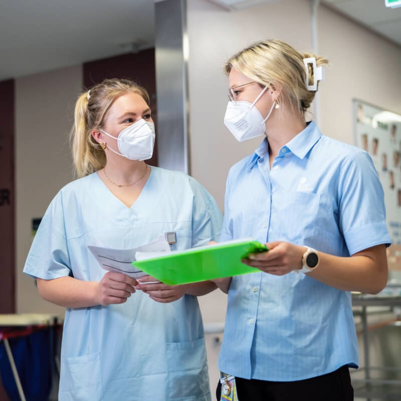 Doctors walking down a hallway